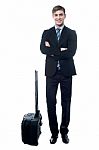 Young Business Man With Trolley Bag Stock Photo