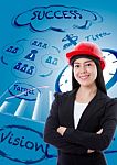 Young Business Woman Has Many Ideas On Business Background Stock Photo