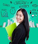 Young Business Woman Has Many Ideas On Business Background Stock Photo