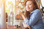 Young Business Woman Sitting In Office Desk Stock Photo