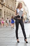 Young Business Woman With Tablet Computer Walking On Urban Stree Stock Photo