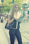 Young Business Woman With Tablet Computer Walking On Urban Stree Stock Photo