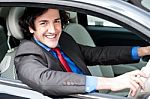 Young Businessman Driving His Car Stock Photo