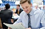 Young Businessman In A Restaurant Stock Photo