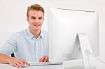 Young Businessman Using Computer Stock Photo