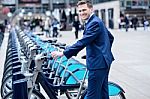 Young Businessman With A Bicycle Stock Photo