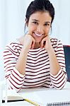 Young Businesswomen Working In Her Office Stock Photo