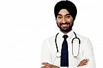 Young Cheerful Isolated Male Doctor Stock Photo