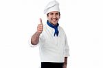 Young Chef Showing Double Thumbs Up Stock Photo