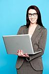 Young Corporate Woman Working On Laptop Stock Photo