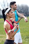 Young Couple Doing Stretching Stock Photo