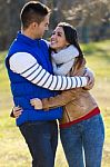 Young Couple In The Park Stock Photo