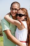 Young Couple Smiling Stock Photo