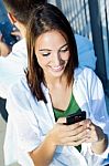 Young Couple With Smart Phone Stock Photo