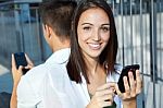 Young Couple With Smart Phone Stock Photo