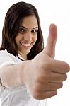 Young Cute Girl Showing Thumbs Up Stock Photo