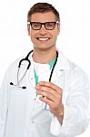 Young Doctor With Medicines Stock Photo