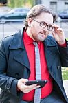 Young Executive Man With A Tablet Stock Photo