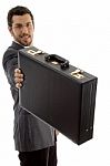 Young Executive Showing His Briefcase Stock Photo