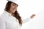 Young Female Architect Holding Open Blue Prints Stock Photo