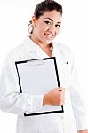 Young Female Doctor Holding Writing Pad Stock Photo