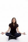 Young Female Doing Yoga Stock Photo