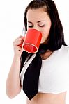 Young Female Drinking Coffee Stock Photo