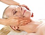 Young Female Getting Head Massage Stock Photo