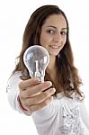 Young Female Showing Light Bulb Stock Photo