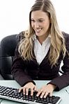 Young Female Working On Computer Stock Photo