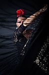 Young Flamenco Dancer In Beautiful Dress On Black Background Stock Photo