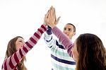 Young Friends With Joined Hands Stock Photo