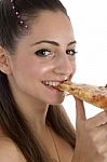 Young Girl Eating Pizza Stock Photo