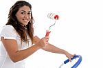 Young Girl Holding Rolling Brush Stock Photo