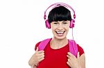 Young Girl Listening To Music, Using Headphones Stock Photo