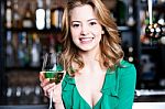 Young Girl With A Glass Of Champagne Stock Photo