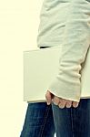 Young Girl With Book On White Background Stock Photo