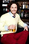 Young Guy Having Chilled Beer At Bar Stock Photo