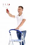 Young Guy Holding Rolling Brush Stock Photo