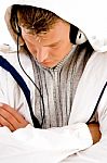 Young Guy Listening To Music With Headphones Stock Photo