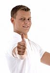 Young Guy Showing Thumbs Up Stock Photo