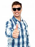 Young Guy Showing Thumbs Up Stock Photo