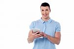 Young Guy Using His Tablet Pc Stock Photo