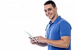 Young Guy Using Tablet Pc Stock Photo