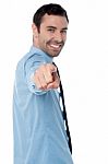 Young Handsome Businessman Pointing At You Stock Photo