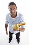 Young Handsome Guy Holding Wine Bottle Stock Photo