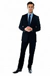 Young Handsome Man In Black Suit Stock Photo