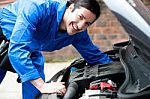 Young Handsome Mechanic Looking At Camera Stock Photo