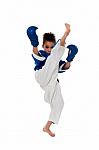 Young Kid Practicing Karate Stock Photo