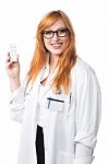 Young Lady Doctor Showing Medicine Stock Photo